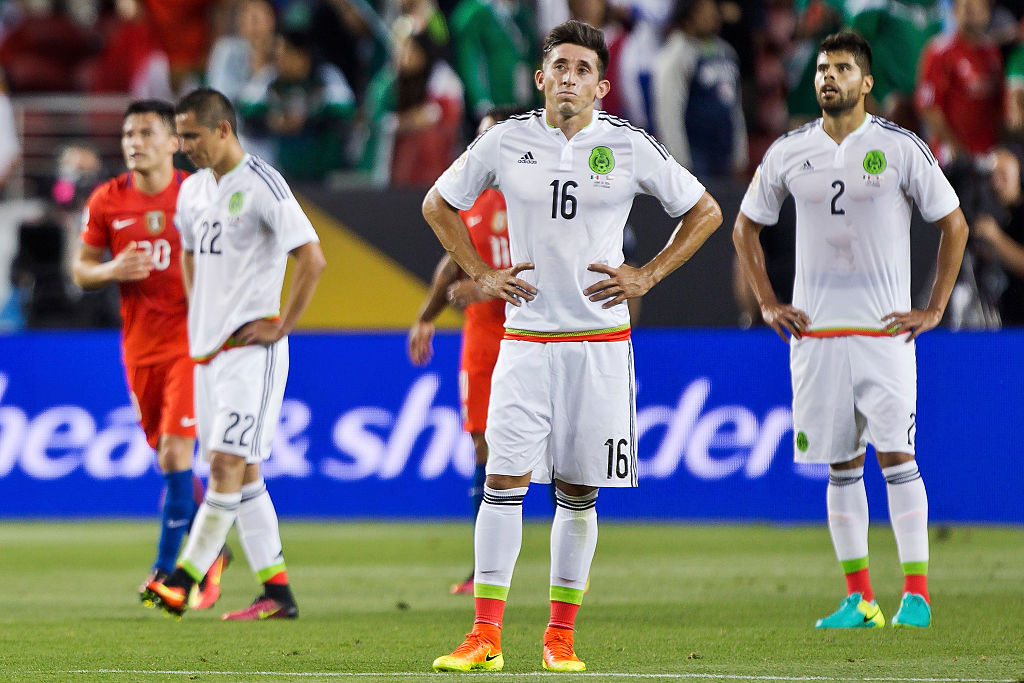 SANTA CLARA, CALIFORNIA - JUNE 18: Paul Aguilar, Hector Herrera, and Nestor Araujo of Mexico react after the seventh of Chile during a Quarterfinal match between Mexico and Chile at Levi's Stadium as part of Copa America Centenario US 2016 on June 18, 2016 in Santa Clara, California, US. (Photo by Brian Bahr/LatinContent/Getty Images)
