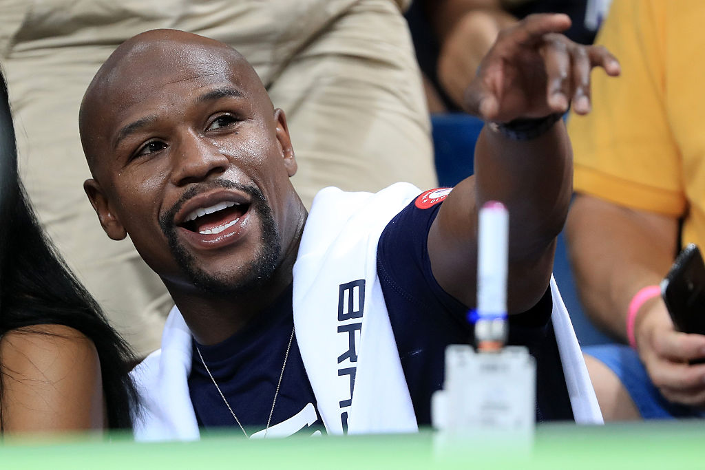 RIO DE JANEIRO, BRAZIL - AUGUST 17: Boxer Floyd Mayweather Jr. sits courtside as the United States takes on Argentina during the Men's Quarterfinal match on Day 12 of the Rio 2016 Olympic Games at Carioca Arena 1 on August 17, 2016 in Rio de Janeiro, Brazil. (Photo by Sam Greenwood/Getty Images)