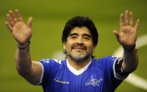 BUENOS AIRES, ARGENTINA - OCTOBER 16:  Diego Maradona greets the fans during a soccer match between Argentina and Uruguay in tribute to Fernando Caceres, victim of an assault on October 16, 2010 in Buenos Aires, Argentina. Maradona  organized this match to help Caceres to continue with his recovery in Cuba. (Photo by Richard Rad/LatinContent/Getty Images)