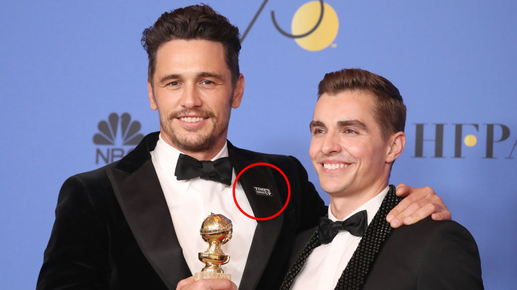 75th Golden Globe Awards – Photo Room – Beverly Hills, California, U.S., 07/01/2018 – James Franco (L) poses with his brother Dave Franco backstage after winning the award for Best Performance by an Actor in a Motion Picture - Musical or Comedy for "The Disaster Artist." REUTERS/Lucy Nicholson